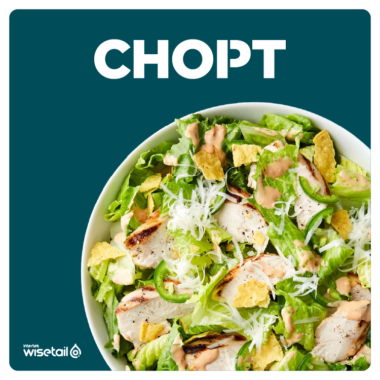 caesar salad with chicken in a bowl on teal background with Chopt logo