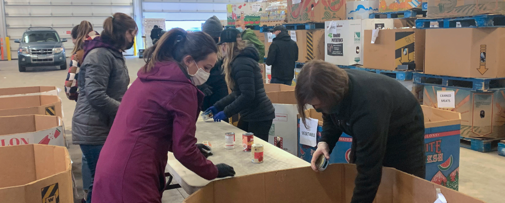 Photo: The Boseman Wisetail team volunteers at a food bank.