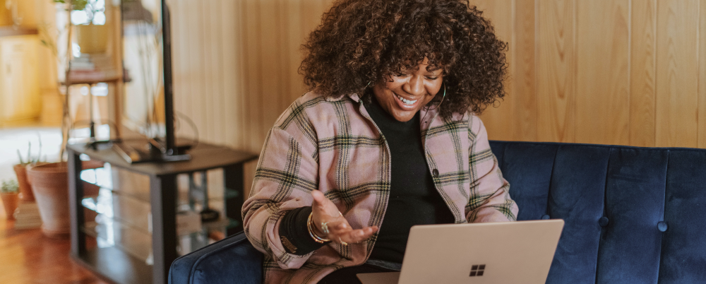 Woman enjoying her time at work because of modern technology